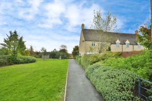 Open green to side of property - click for photo gallery